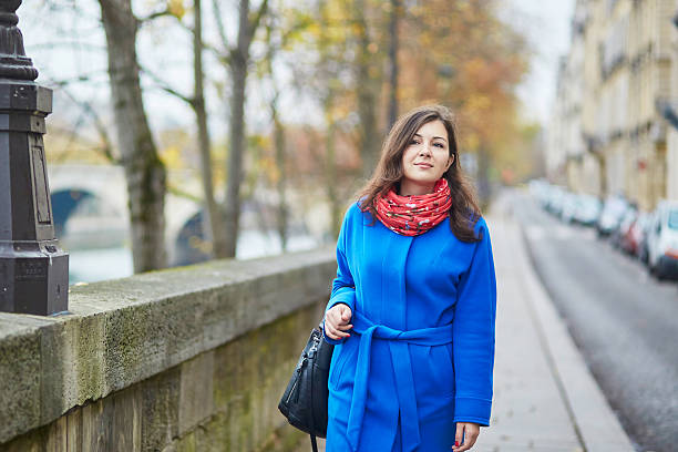 istock Beautiful young tourist in Paris on a fall day 544322704