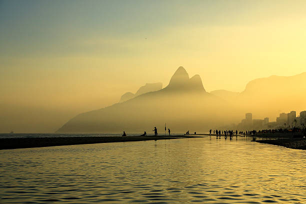 Sunset in Ipanema Beach - with a fog stock photo