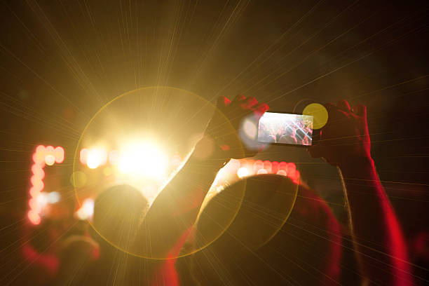 istock Silhouettes of people and musicians 544326546