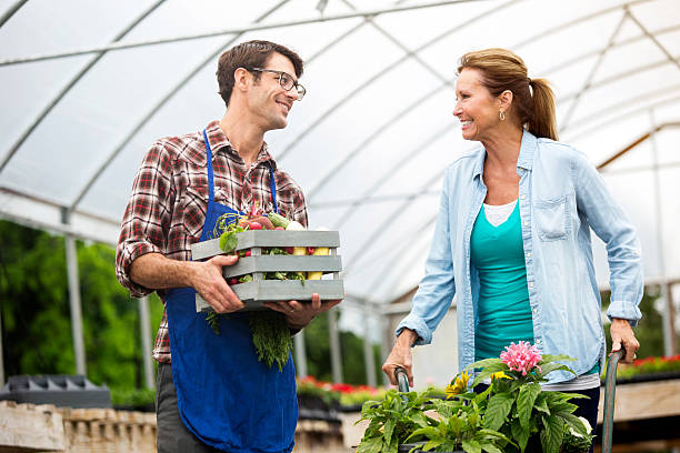istock Happy shopper at her local plant nursery 544326926