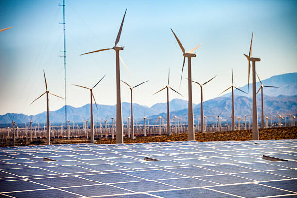 istock Field of Solar Panels and Windmills 544330316
