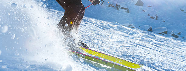 istock Skier turning on a blue sky day 544330676