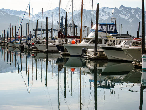 istock Reflection of Boats with mountain on background in Seward 544334664
