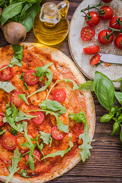 istock margherita pizza on wooden table 544335334