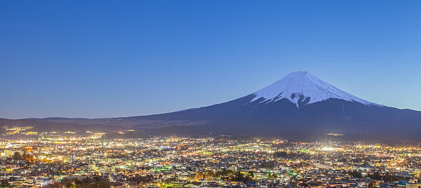 istock Fujiyoshida Town at night time with Mount Fuji 544336148