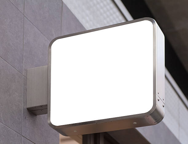 istock Blank metal shop sign board on building wall 544337706