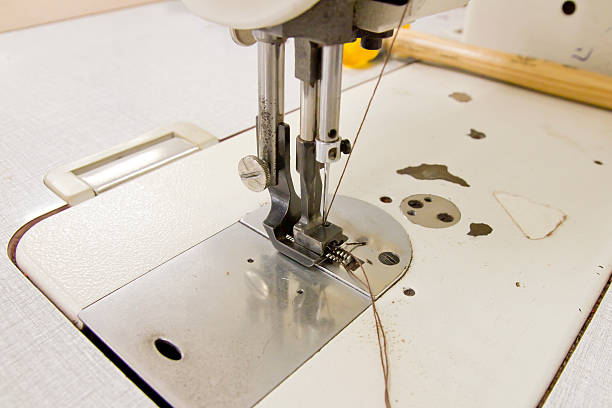 istock Closeup of sewing machine working part 544337822