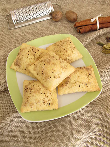 istock Savory crackers with salt, coffee, cinnamon, cardamom, nutmeg, cloves, allspice 544338018