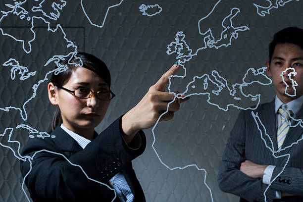 istock Businesswoman with a presentation while showing a map on boss 544338154