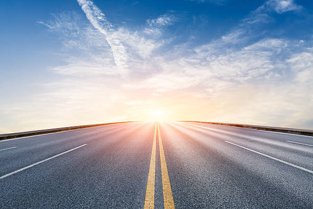 New asphalt highway scenery at sunset New asphalt highway Beautiful scenery at sunset highway stock pictures, royalty-free photos & images