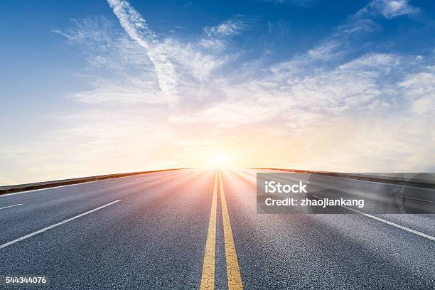 New Asphalt Highway Scenery At Sunset Stock Photo - Download Image Now - Road, Highway, The Way Forward