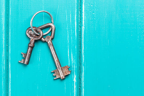 istock old key on a blue wooden background 544344800