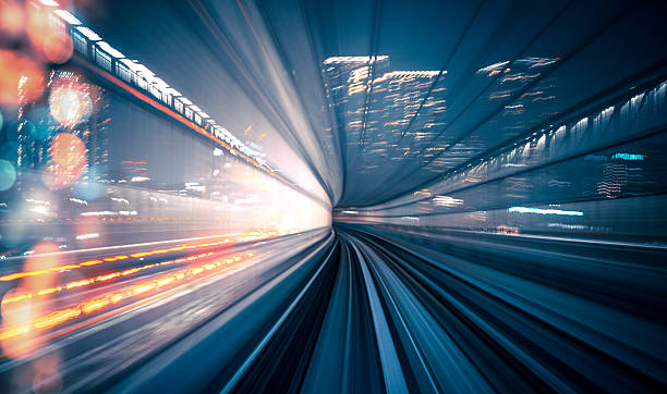 Speed - Train in Tokyo abstract motion-blurred view from the front of a train in Tokio, Japan railroad track photos stock pictures, royalty-free photos & images