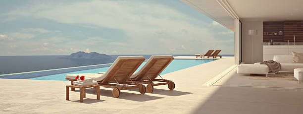 istock luxury swimming pool. color edit.3d rendering 544346354