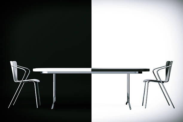 istock Confrontation Concept. Black and White Chairs and Desk. 3d Rende 544346378