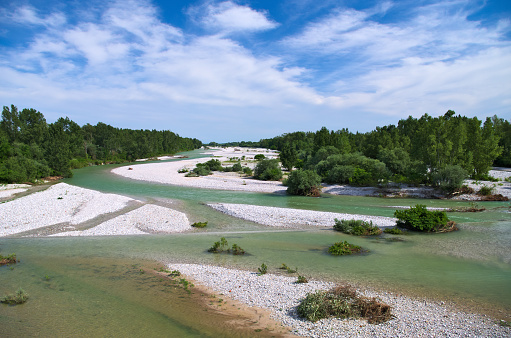 Natural gravel bed of the Torre river in Friuli, Italy