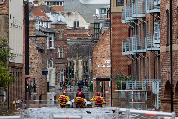York Floods - September 2012 - UK York, United Kingdom - September 27, 2012: The River Ouse overflows following a period of heavy rain and floods the streets of central York in the United Kingdom.  ouse river photos stock pictures, royalty-free photos & images