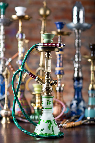 istock group of eastern hookahs on wood table 544349074