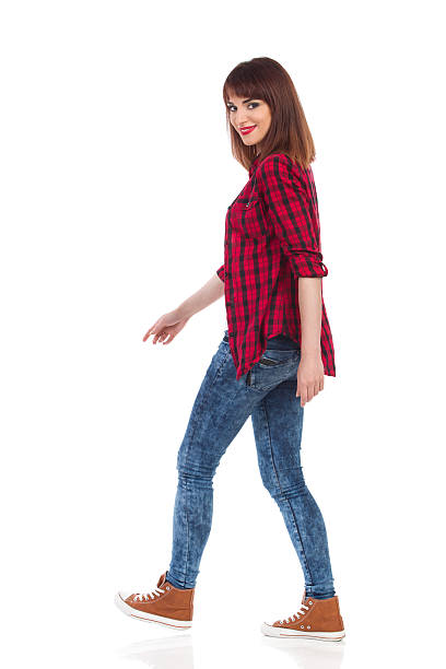 istock Walking Woman Looking Over The Shoulder 544349090