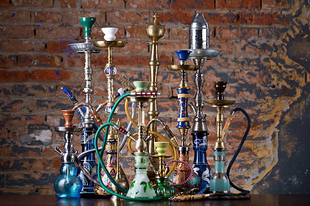 istock group of eastern hookahs on wood table 544349190