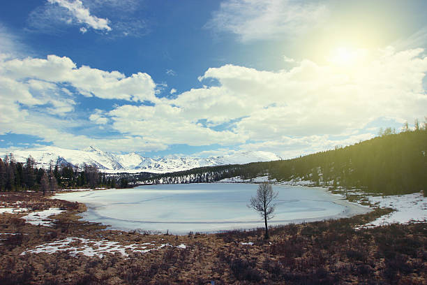 Mountain snowy lake. Russia, Siberia, Altay. Kidelu lake. stock photo