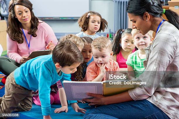 Storytime At Nursery Stock Photo - Download Image Now - Child, Preschool, Storytelling
