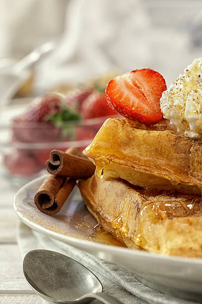 istock Waffles with Fresh Strawberries and cinnamon 544351796