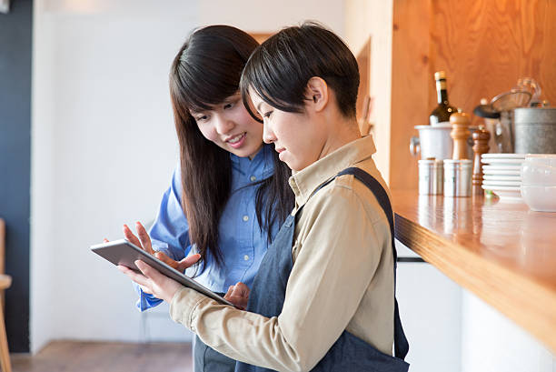 Young japanese lady manager of cafe restrant