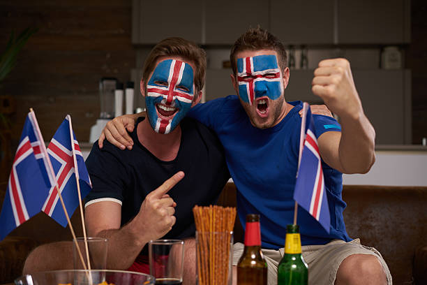 istock cheering Iceland fan mates 544352870