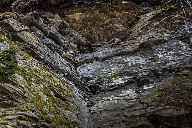 istock Stone wall of rock with cracks 544353946