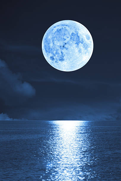istock Moonrise over sea / ocean. 544354352