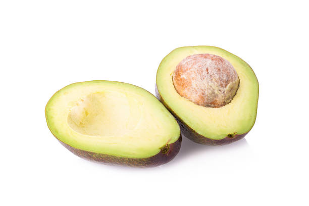 istock Avocado slices isolated on a white background 544354466