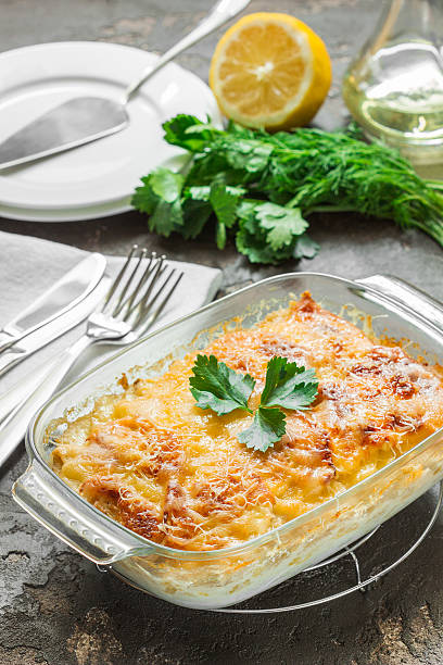 istock Potato casserole with melted cheese, green apple and lemon 544355318