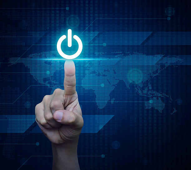 istock Pressing power button, Elements of this image furnished by NASA 544355718