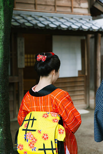 istock The Japanese couple talking at gareage  in Edo perioud. 544355844
