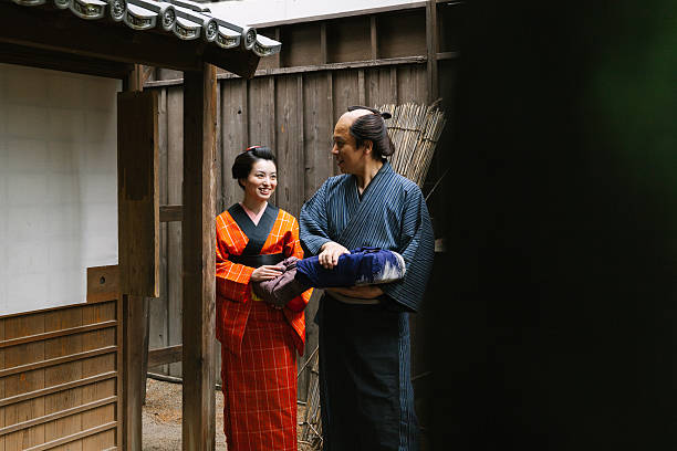 istock The Japanese couple talking at gareage  in Edo perioud. 544355896