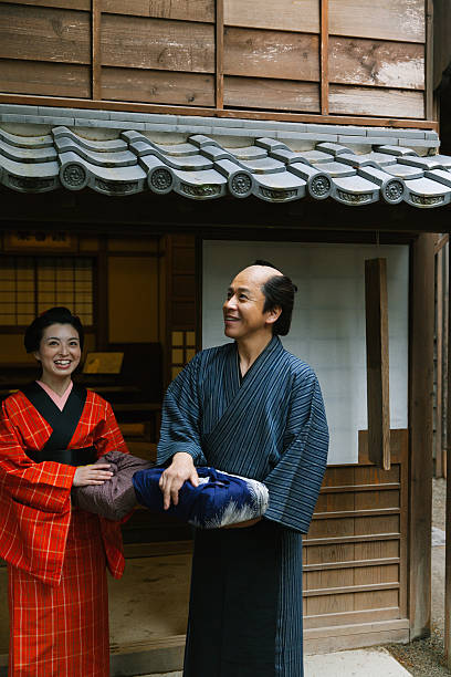 istock The Japanese couple talking at gareage  in Edo perioud. 544355944