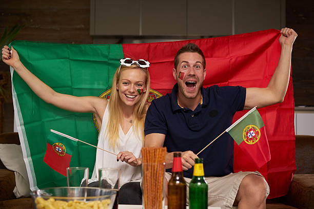 istock Portuguese soccer fan couple 544356048