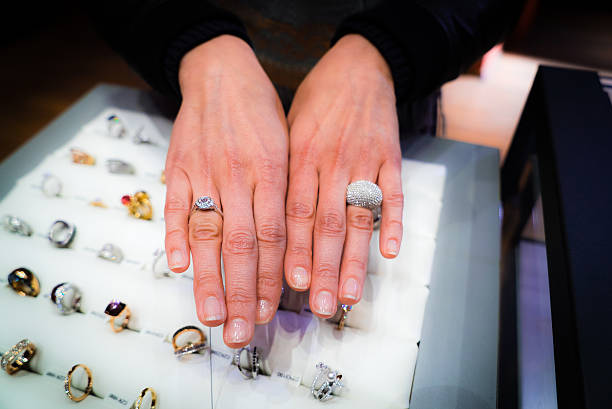 istock woman fitting new rings 544357212