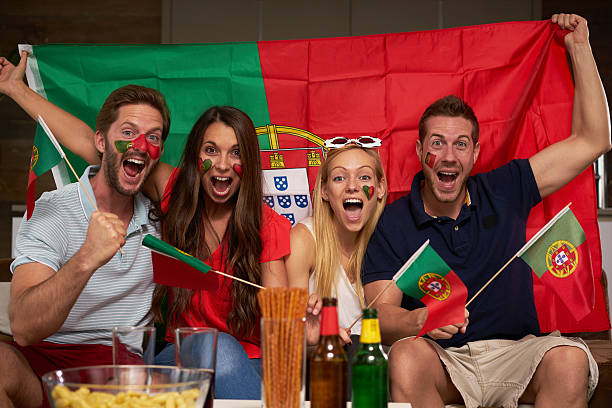 istock four enthusiastic Portuguese soccer fans 544357314