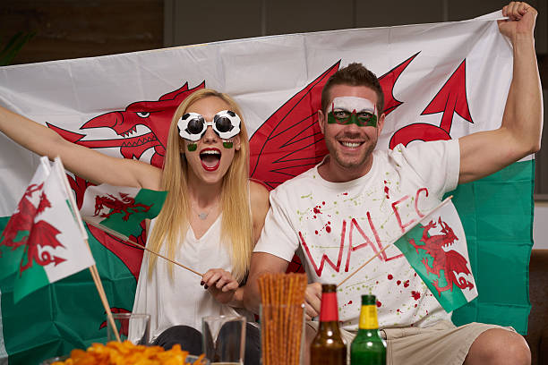 istock soccer fan couple supporting Wales 544357960