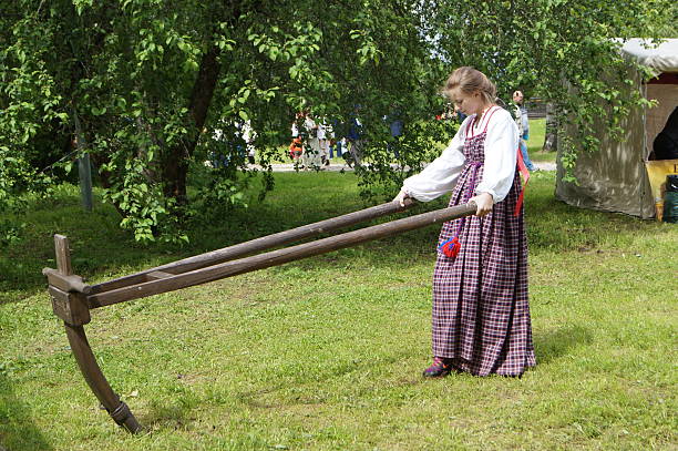 istock country girl pulls the plow, to  the land 544358112