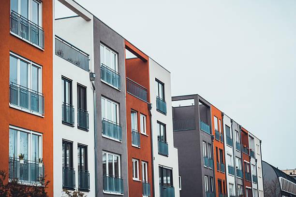 istock red, white and grey colored townhouses 544359190
