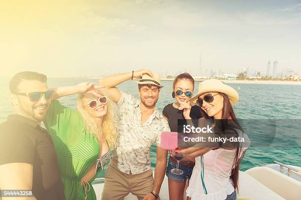 Friends Having Boat Party In Dubai Stock Photo - Download Image Now - Dubai, Selfie, Luxury