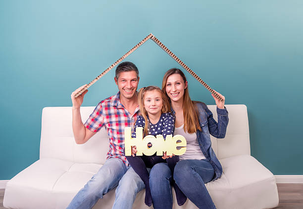 holding home letters for real estate stock photo