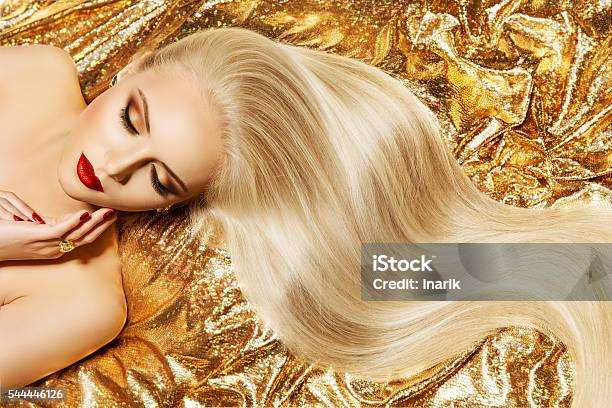 Fashion Model Gold Color Hair Style Woman Long Waving Hairstyle Stock Photo - Download Image Now