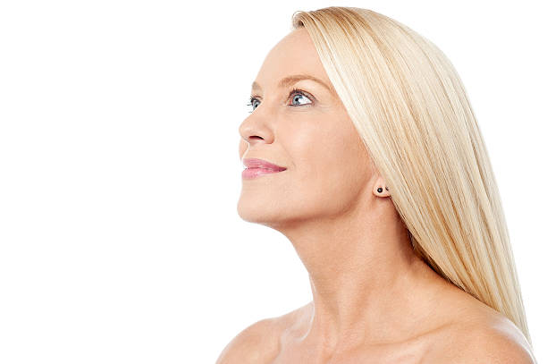 istock Pretty smiling woman looking upwards 544447366