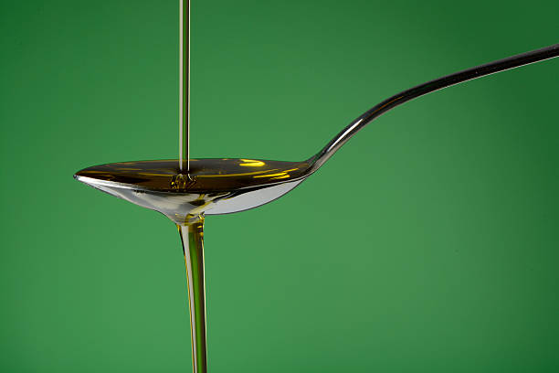 istock Pouring olive oil 544447860