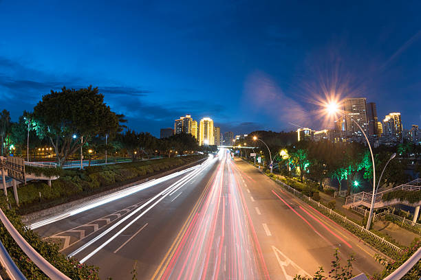 istock Traffic flow and road at dusk 544448090