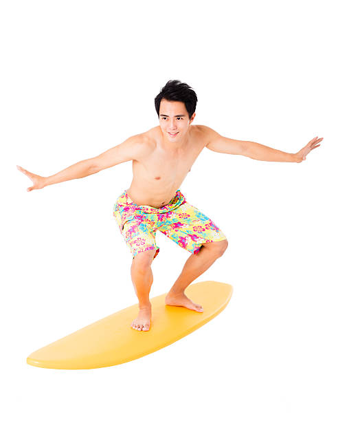 istock Young man with surfboard isolated on white 544448098
